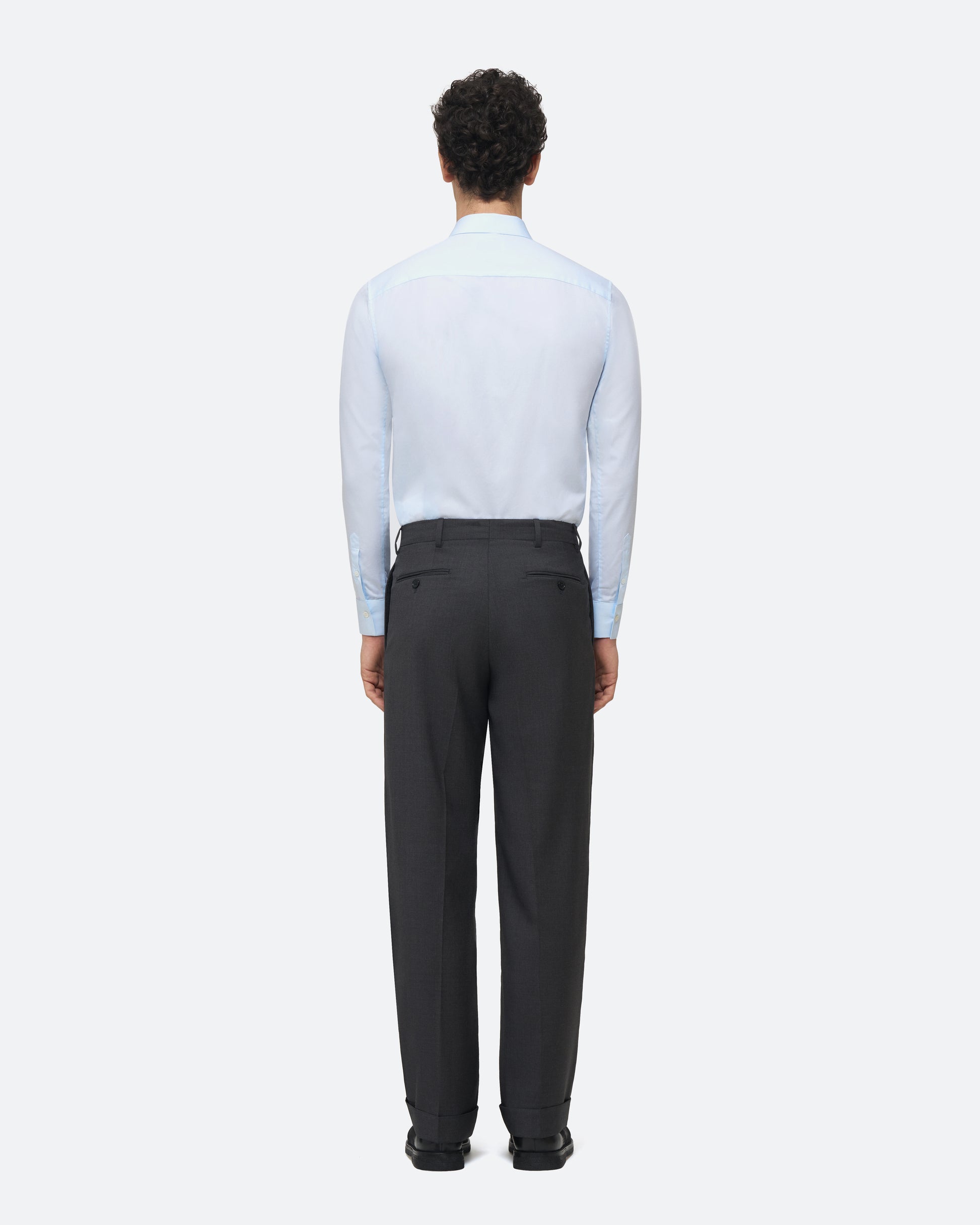 Wool Pleated Trouser in Charcoal on model